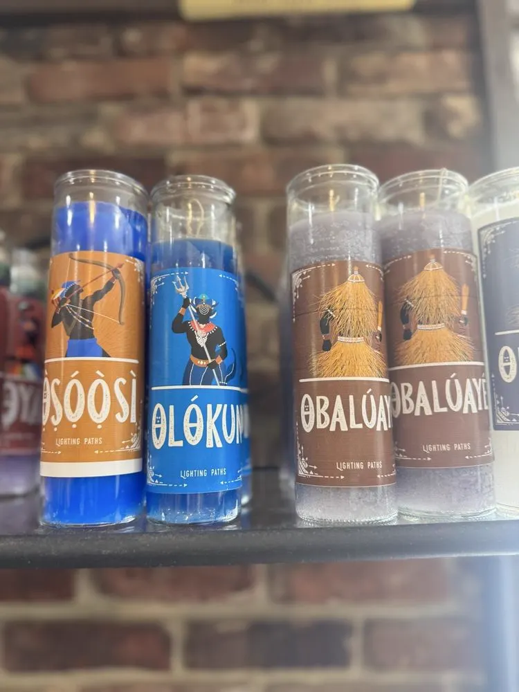 Orisha candles on the shelf